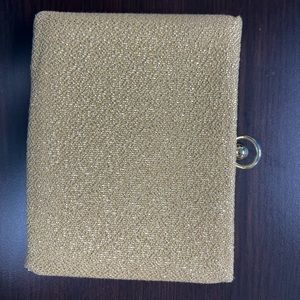 Princess Gardner Gold Glittering Wallet. Ball and Hoop Snap opens wallet.